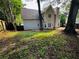Exterior view showcasing the backyard, a patio, and the home's siding at 108 Northcutt Station Pl, Acworth, GA 30101