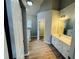 Primary bath with double sinks, and separate tub and walk-in closet at 108 Northcutt Station Pl, Acworth, GA 30101