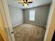 Bedroom with plush carpet, neutral color palette and natural light at 108 Northcutt Station Pl, Acworth, GA 30101