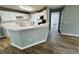 The open kitchen with a large island and a breakfast bar for casual meals at 108 Northcutt Station Pl, Acworth, GA 30101