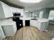This kitchen includes stainless appliances, ample storage and views into the living spaces at 108 Northcutt Station Pl, Acworth, GA 30101