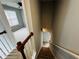 Staircase leading downstairs with a view of a bedroom at the top of the stairs at 108 Northcutt Station Pl, Acworth, GA 30101