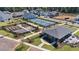 Aerial view showcasing community amenities with tennis courts and garden plots at 199 Vinca Nw Cir, Kennesaw, GA 30144