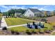 Community lawn with Adirondack chairs providing a relaxing outdoor space at 199 Vinca Nw Cir, Kennesaw, GA 30144