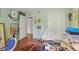 Neutral bedroom features hardwood floors, closet space and decor at 2493 Springdale Rd, Atlanta, GA 30315