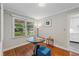 Cozy dining area with hardwood floors and a bright window at 2493 Springdale Rd, Atlanta, GA 30315