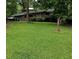 Charming single-story home nestled on a lush green lawn with mature trees at 2493 Springdale Rd, Atlanta, GA 30315