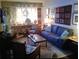 Inviting living room featuring comfortable seating, a decorative rug, and ample natural light at 2493 Springdale Rd, Atlanta, GA 30315