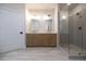 Modern bathroom with double vanity, walk-in shower, and neutral-toned tile flooring at 512 Winston Croft Cir # 56, Johns Creek, GA 30022