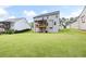 Open backyard showcasing a large lawn, perfect for Gathering fun at 1016 Buckeye Ln, Villa Rica, GA 30180