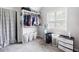 Walk-in closet with custom shelving, ample storage, and natural light at 1016 Buckeye Ln, Villa Rica, GA 30180