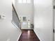 Bright foyer with hardwood floors, staircase, and a high ceiling that creates an open feel at 1016 Buckeye Ln, Villa Rica, GA 30180