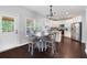 Bright eat-in kitchen with white cabinets, stainless steel appliances, and a view of the backyard at 1016 Buckeye Ln, Villa Rica, GA 30180