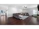 Open-concept living area with hardwood floors, recessed lighting, and neutral color palette at 1016 Buckeye Ln, Villa Rica, GA 30180