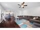 Expansive living room area connects seamlessly to the kitchen with dark wood flooring at 1016 Buckeye Ln, Villa Rica, GA 30180