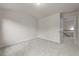 Simple bedroom with carpet and access to a hallway at 2396 Whiteoak Se Bnd # 16, Smyrna, GA 30080