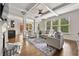 Well-lit living room showcasing hardwood floors, a fireplace, and an open layout at 2396 Whiteoak Se Bnd # 16, Smyrna, GA 30080