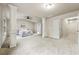 Spacious bedroom features neutral decor, ceiling fan, and an ensuite bathroom entrance for a serene retreat at 2396 Whiteoak Se Bnd # 16, Smyrna, GA 30080