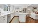 Bright kitchen with stainless steel appliances, center island, and seamless connection to the living area at 435 Grenock Cir, Atlanta, GA 30328