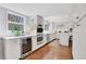Modern kitchen with stainless steel appliances, a wine fridge, and abundant cabinet space for optimal storage at 435 Grenock Cir, Atlanta, GA 30328