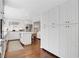 Bright kitchen features white cabinets, stainless steel appliances, and central island at 435 Grenock Cir, Atlanta, GA 30328