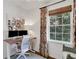 Cozy office space features a computer desk, decor curtains and a window with natural light at 435 Grenock Cir, Atlanta, GA 30328
