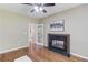 Sitting area with a fireplace and a French door entry at 5115 Amberden Hall Dr, Suwanee, GA 30024