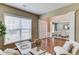Bright and airy office space with hardwood floors, large windows, and views of the entryway at 5115 Amberden Hall Dr, Suwanee, GA 30024