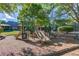 Community playground with slides and climbing structures for Gathering fun at 5115 Amberden Hall Dr, Suwanee, GA 30024