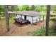Home with a spacious backyard and deck that are perfect for outdoor entertaining at 537 Eastside Dr, Dacula, GA 30019