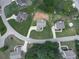 Aerial view of a property in a neighborhood, showcasing the layout and surrounding landscape at 114 Saddle Wood Dr, Dallas, GA 30157