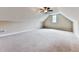 Large bonus room or attic with carpet, neutral walls, and ceiling fan at 114 Saddle Wood Dr, Dallas, GA 30157