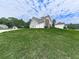 Exterior view of a house, showcasing a well-maintained front lawn at 114 Saddle Wood Dr, Dallas, GA 30157