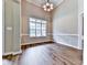 Bright living room with large windows and neutral paint at 114 Saddle Wood Dr, Dallas, GA 30157