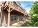 Brick townhouse backyard with green space, patio and covered wood deck at 3133 Quinn Pl, Atlanta, GA 30341