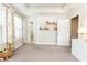 Bedroom featuring lots of natural light, neutral walls, plush carpet, and small wall-mounted bookshelves at 3133 Quinn Pl, Atlanta, GA 30341