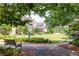 Lush green space with benches, trees, and manicured landscaping for relaxation at 3133 Quinn Pl, Atlanta, GA 30341