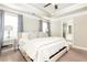 Bright main bedroom features tray ceilings, carpeting, and natural light for a warm and inviting space at 3133 Quinn Pl, Atlanta, GA 30341