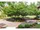 Serene park area with benches, mature trees, and beautifully paved walkways at 3133 Quinn Pl, Atlanta, GA 30341