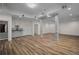 Basement features columns, recessed lights, and luxury vinyl flooring at 8630 Moor Park Run, Duluth, GA 30097
