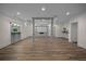 Spacious basement featuring a bar, home theater, and luxury flooring at 8630 Moor Park Run, Duluth, GA 30097