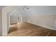 Spacious bonus room with hardwood floors and a vaulted ceiling at 8630 Moor Park Run, Duluth, GA 30097