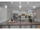 Stylish kitchen with granite countertops, stainless steel appliances, and custom cabinetry at 8630 Moor Park Run, Duluth, GA 30097