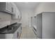Mudroom with granite countertops, cabinets, and storage solutions for organization at 8630 Moor Park Run, Duluth, GA 30097