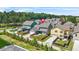 A mid-angle view of the houses showing their yards and fencing around them at 9990 Blackfriars Rd, Douglasville, GA 30135