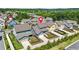 A mid-angle view of the neighborhood showing green trees, sidewalks, and landscaping at 9990 Blackfriars Rd, Douglasville, GA 30135
