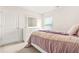Bedroom with a bed, window, and dresser at 9990 Blackfriars Rd, Douglasville, GA 30135