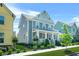 Charming two-story home with well-manicured lawn and colorful landscaping at 9990 Blackfriars Rd, Douglasville, GA 30135