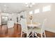 Bright kitchen with white cabinetry, stainless steel appliances, and a cozy breakfast nook at 9990 Blackfriars Rd, Douglasville, GA 30135