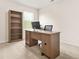 Home office featuring a desk, chair, bookcase, and window providing natural light at 9990 Blackfriars Rd, Douglasville, GA 30135